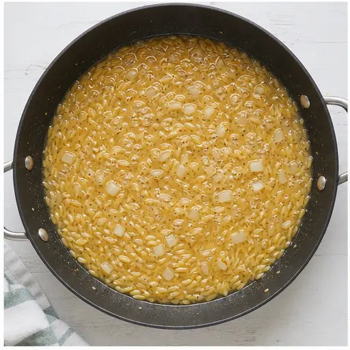 Step 3: Cooking orzo in broth with aromatics