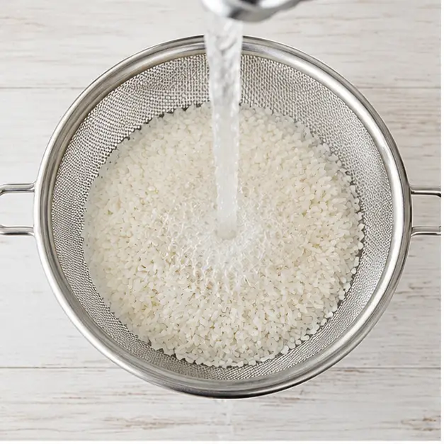 Step 1: Rinse the rice in a fine-mesh strainer