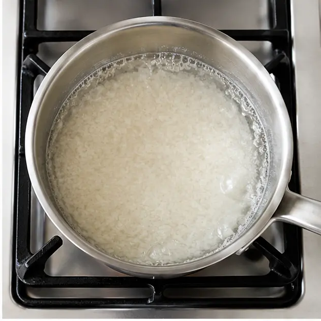 Step 2: Bring rice, water, and oil to a boil