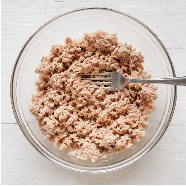 Step 2: Flaking the tuna with a fork