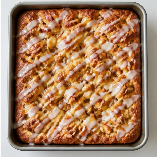 Step 4: Bake the dimpled focaccia until golden and finish with a vanilla glaze drizzle