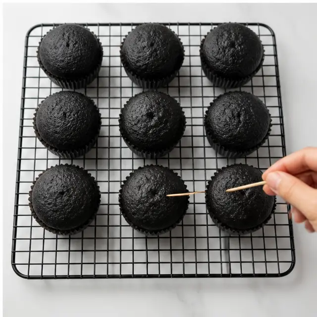 Cool baked cupcakes on a wire rack
