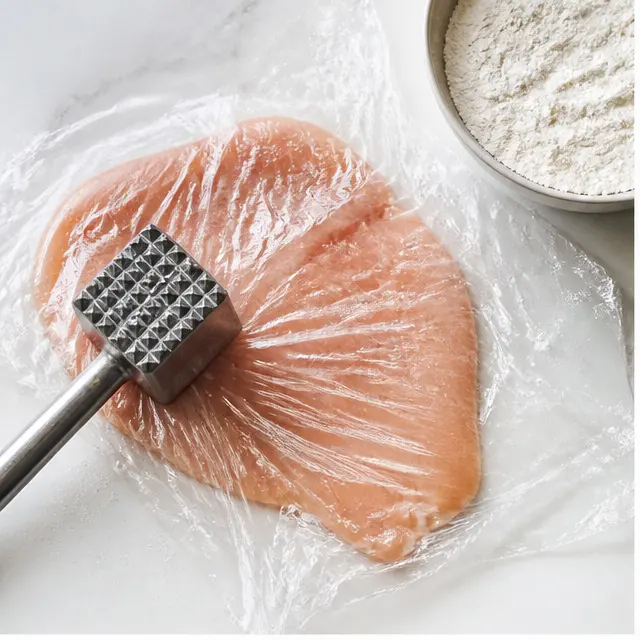 Step 1: Pounding the chicken cutlets thin with a meat mallet