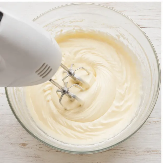 Step 3: Beat cream cheese with sweetened condensed milk until smooth