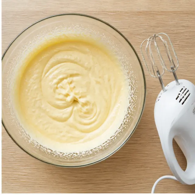 Step 2: Beating eggs with sugar until pale and doubled in volume