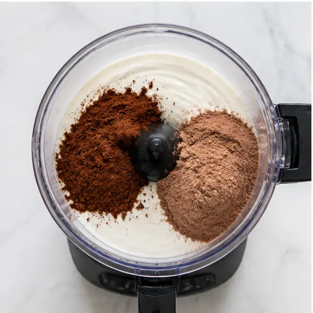 Step 3: Add protein powder, cocoa, and maple syrup