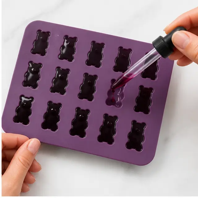 Step 2: Filling silicone gummy molds with an eyedropper