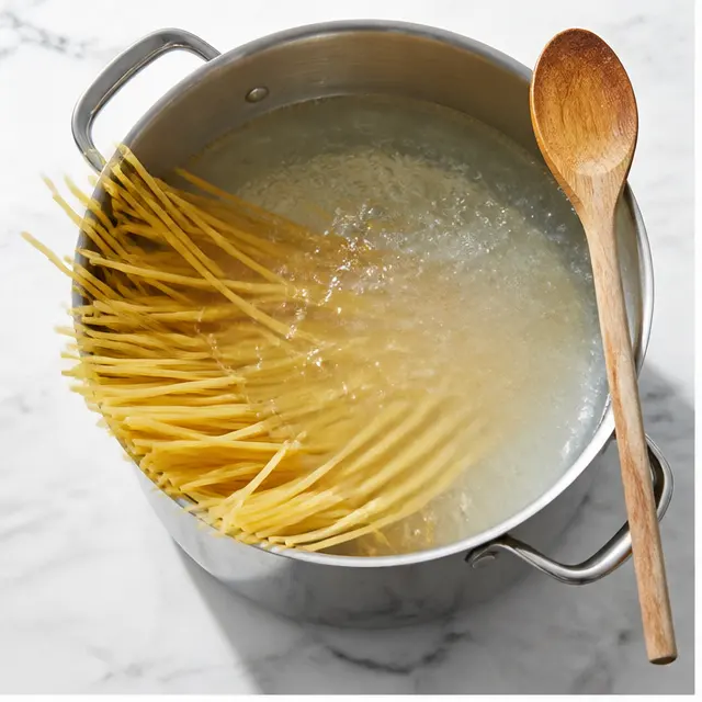 Boiling the linguine pasta in salted water