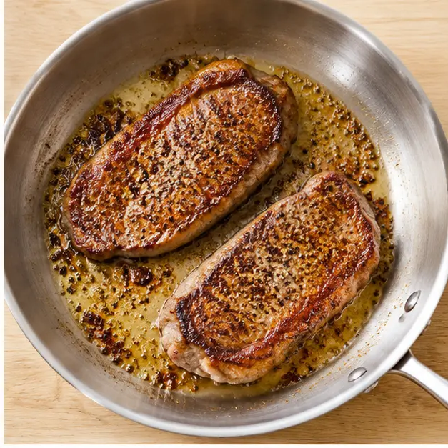 Step 2: Sear steaks in shimmering olive oil until a deep golden brown crust forms