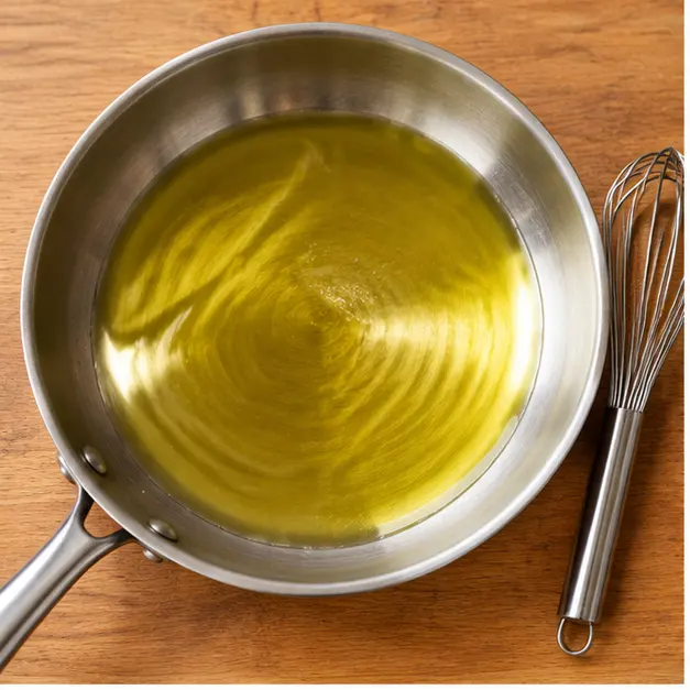 Step 1: Warming golden olive oil in a medium skillet until it shimmers